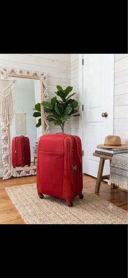 Samsonite red spinner luggage