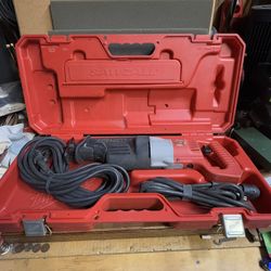 Milwaukee Super Orbital Sawzall 6521-50 with 2 cords and several nice blades. 