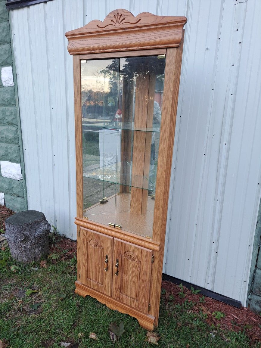 Oak Finish Corner Lighted  Display Cabinet. 
