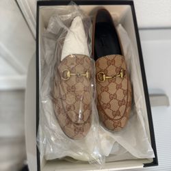 Gucci Women's Tan GG Loafers with Gold Accents