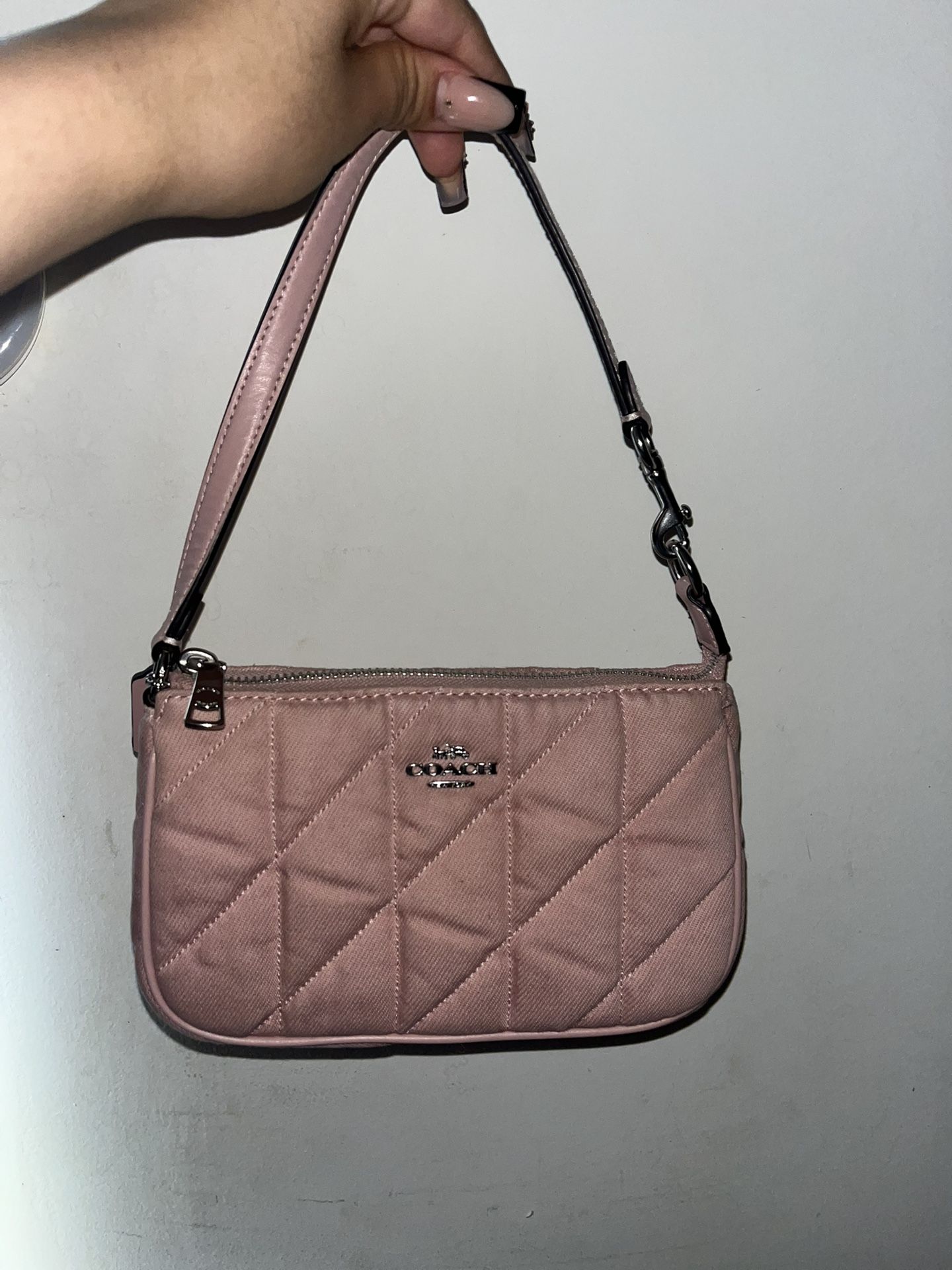 pink denim coach nolita 