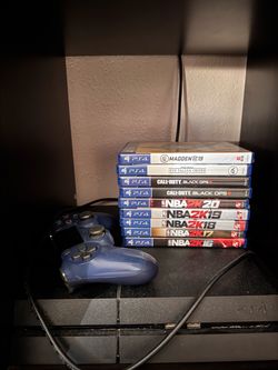 PlayStation 4 w/ controller + games