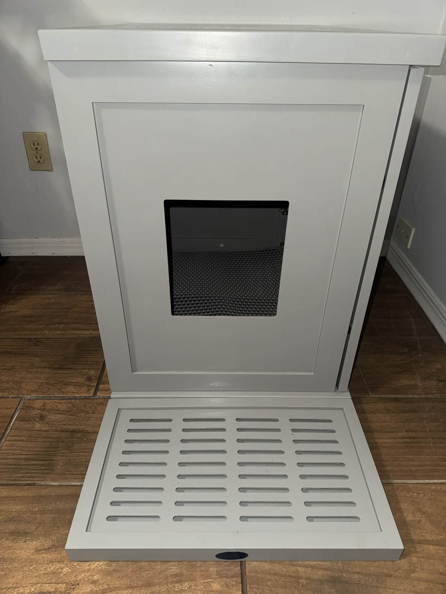 Refined Feline Cat box enclosure cabinet with a drawer and a litter mat