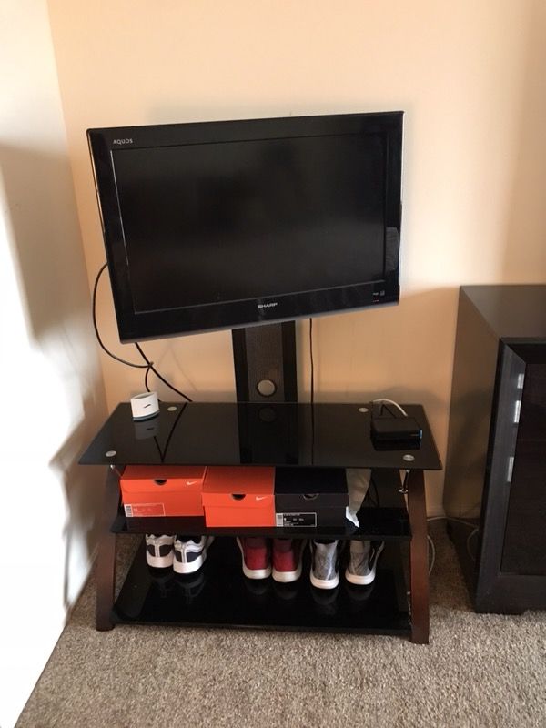 TV STAND AND TV 150. MOVING SALE