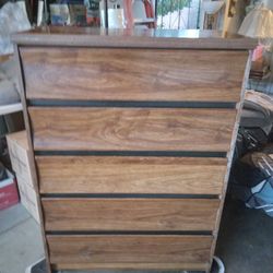 Dresser With Five Clean Drawers For Storage