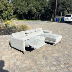 Two piece sectional Couch with electric recliner