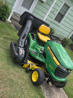 JOHN DEERE X320 22HP 675CC KAWASAKI  POWERED 48" CUT HYDROSTATIC DRIVE RIDING MOWER  390 HOURS