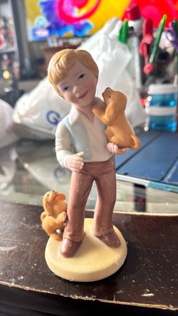 Boy with Puppies Porcelain Figurine