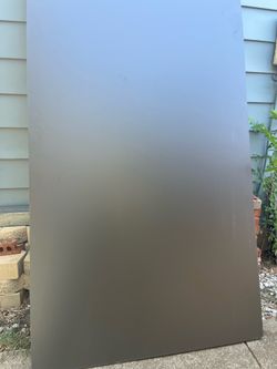 Particle board laminated