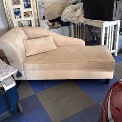 Small White Couch With A Pillow