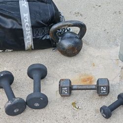 Weight Bench Set Up W/ Punching Bag, Rope, Barbells, Weights