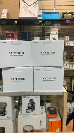 FujiFilm X-T30iii with 13-33mm.  Silver or charcoal