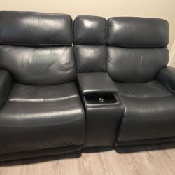 Living Spaces Reclining Sofa With Console 
