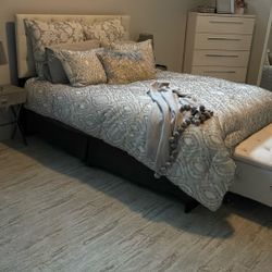 Queen size tufted headboard bedroom set complete with five drawer, upright dresser, and nightstands