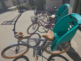 Beach cruisers one purple blue one gray