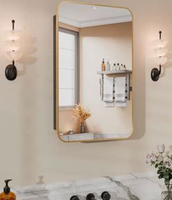 New bathroom faucet and mirror/cabinet
