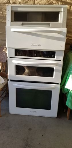 Kitchen Aid electric wall oven, microwave, exhaust.