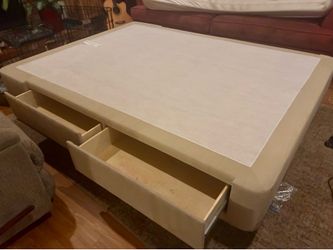 Queen bed frame with built in storage and quilted upholstery