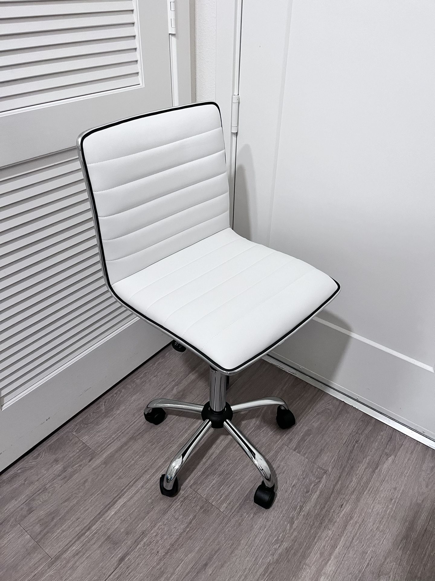 Brand New Low Back Ribbed Armless Swivel White Desk Chair