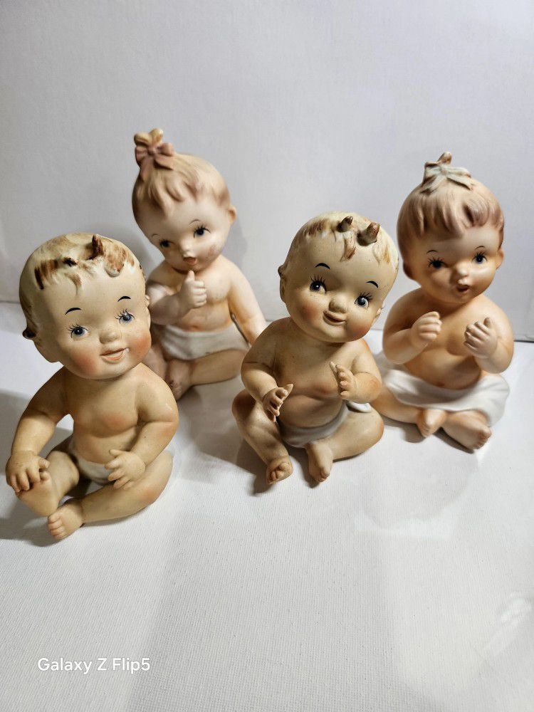4 Vintage Napco. Kewpie Baby Figurines 