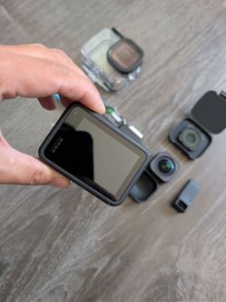 GoPro 10 action camera with extra batteries and lens
