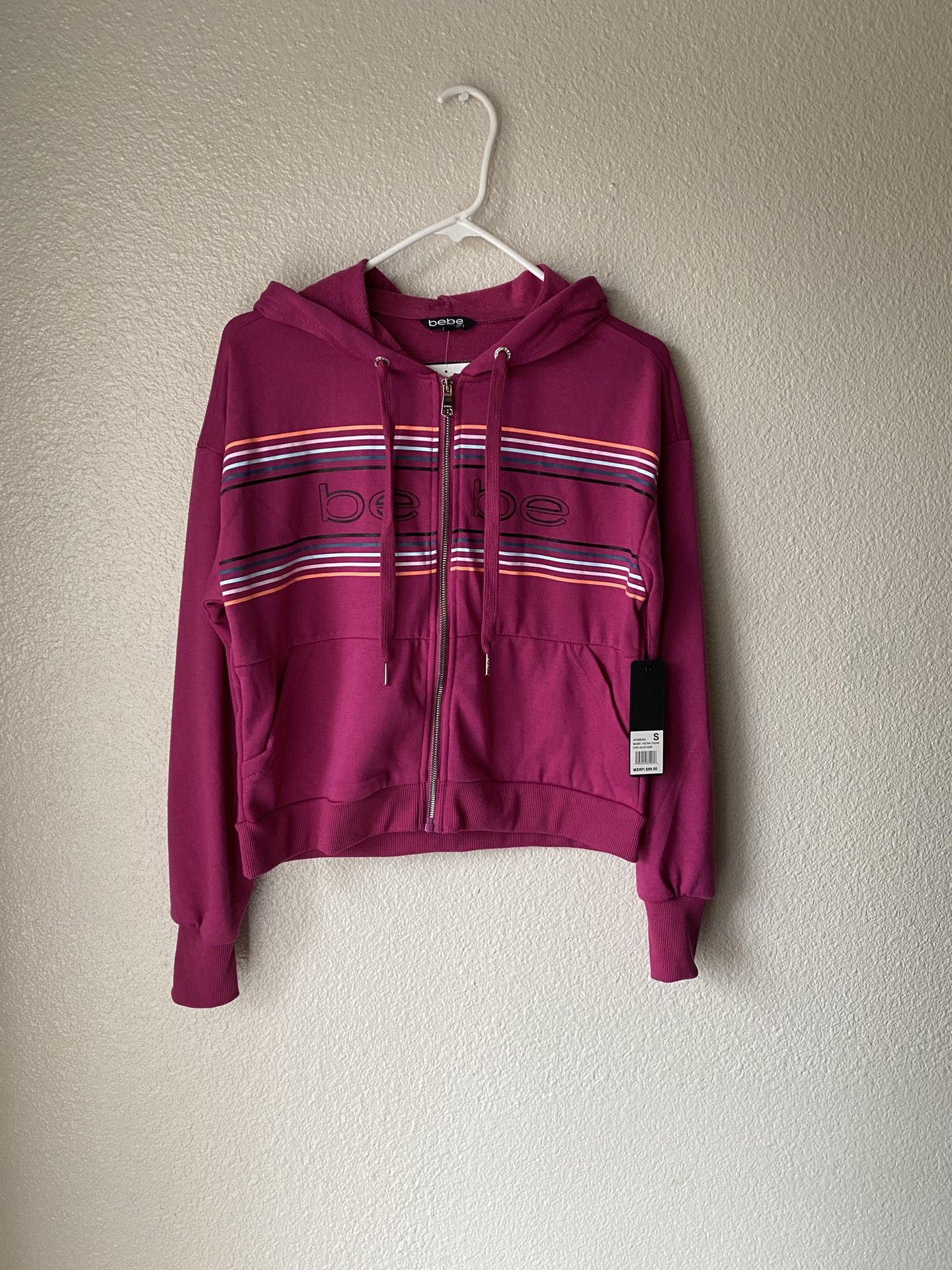 Brand new woman’s Bebe brand pink colored hoodie up for sale