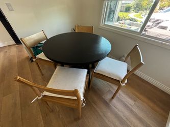 Black wood dining table with 4 chairs