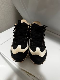 Black/White Under Armour Baseball Cleats