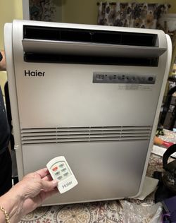 Salvaged / not cooling portable A/C unit May need freon, since electrically it seems to work. As-Is