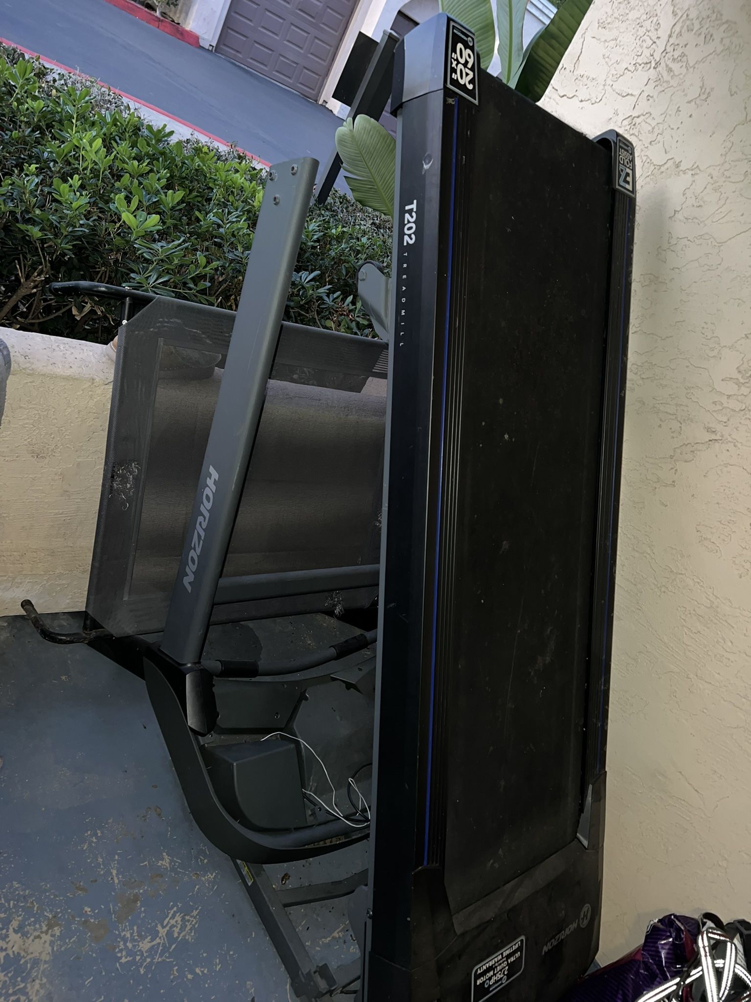 Horizon Fitness T202 treadmill 60”x20”