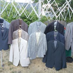 Lot Of Suit Coats And Pants