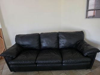 Black sofa and loveseat