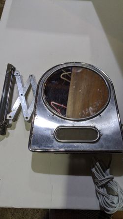 Antique chrome retractable shaving mirror