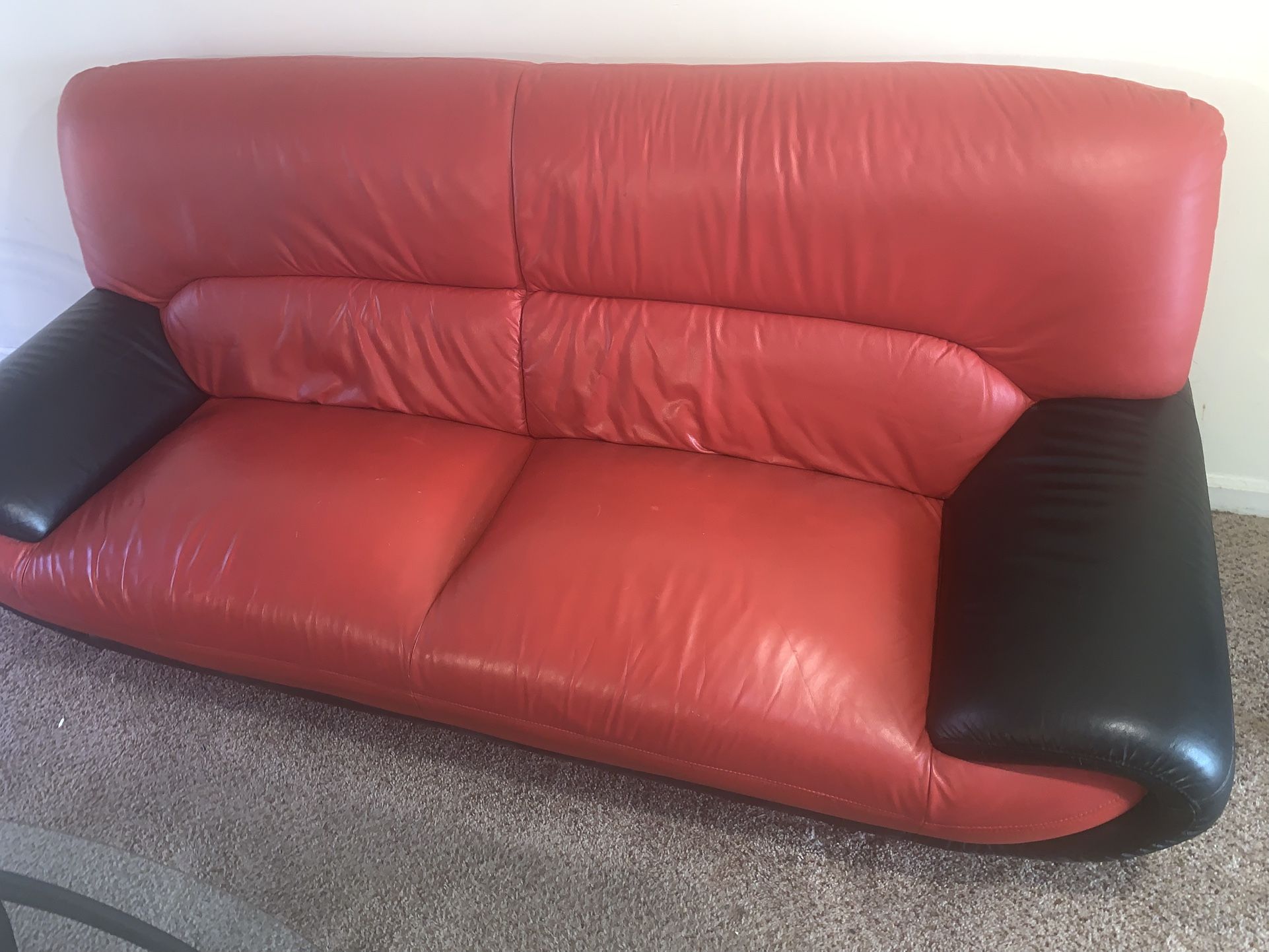 OFFICIAL LEATHER RED COUCH