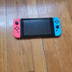Nitendo Switch With 3 Games,a Case, And A Charger