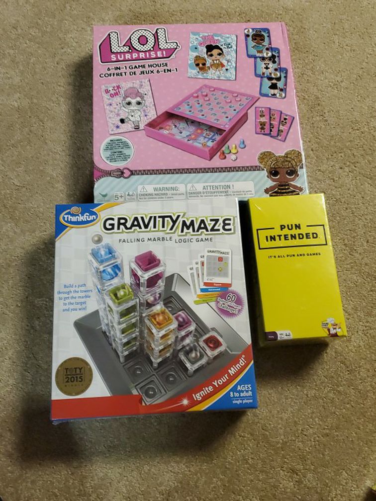 3 Board Games. Never Opened. 1. LOL SUPRISE 6 In 1 Game House, GRAVITY MAZE, and PUN INTENDED