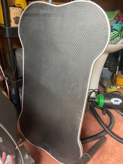 Bone shaped folding grooming table