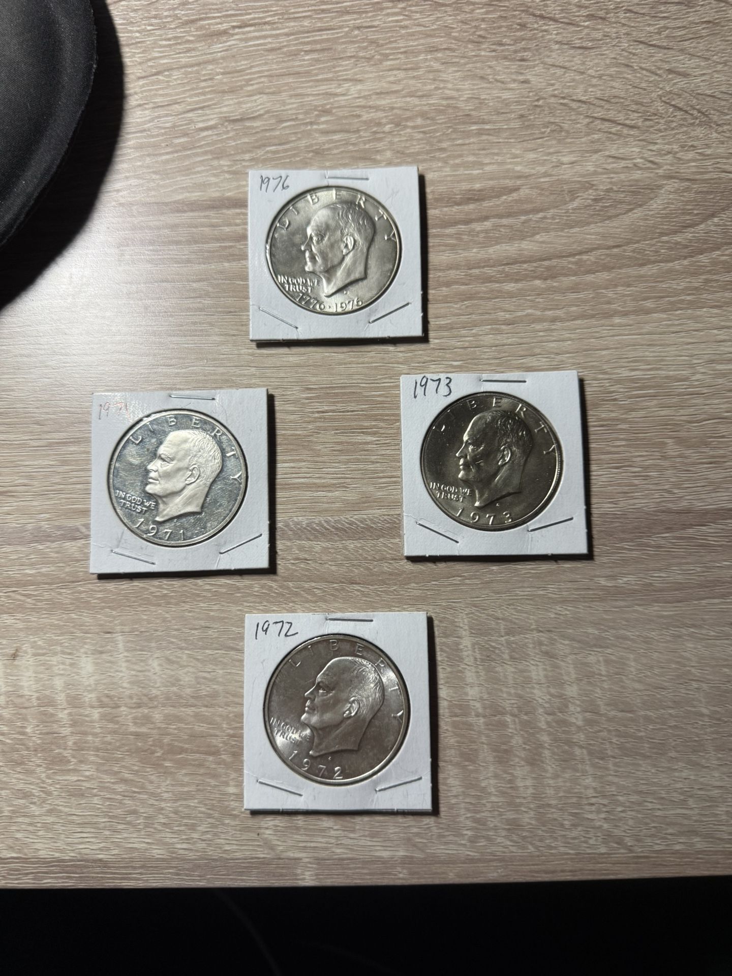Four Silver Eisenhower Dollars (1971, 1972, 1973, 1976)
