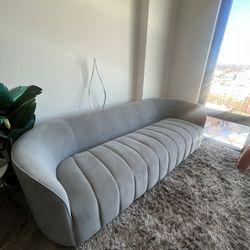 Grey velvet channel tufted