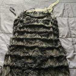 It’s Very Cute Short Cocktail Dress The Size Is Six. The Color Is Black. It’s All Tassel.Dress 