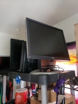 Set of four flat screen monitors