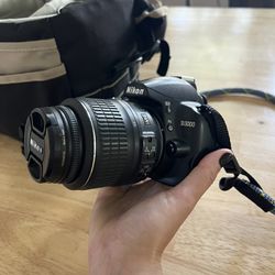 Nikon D3000 Digital SLR Camera with Nikkor Zoom Lens
