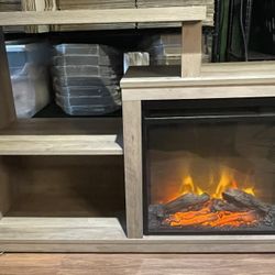 Entertainment Stand with Heated Faux Fireplace . 