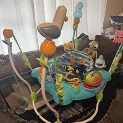 Bright Starts Disney Baby Finding Nemo Sea of Activities Baby Activity Center Jumper with Interactive Toys, Lights, Songs & Sounds, 6-12 Months (Blue)