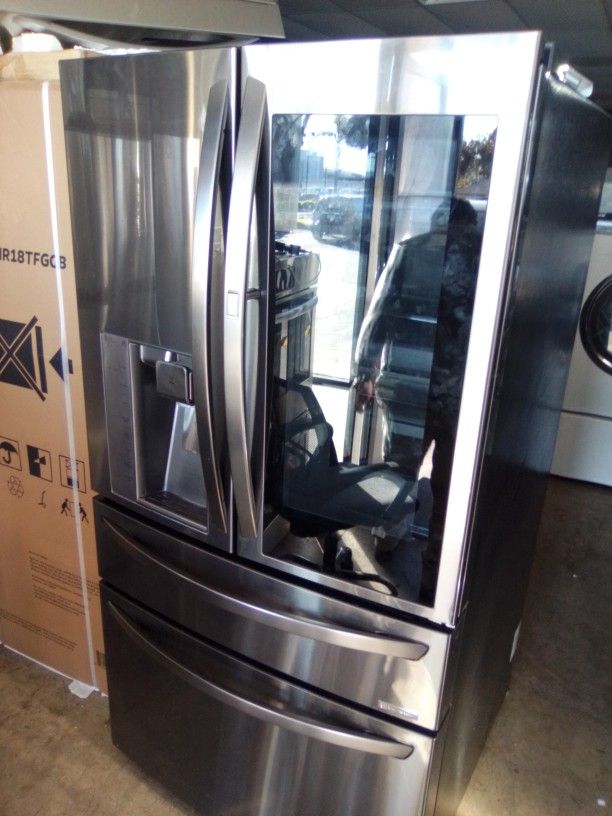 LG BLACK STAINLESS STEEL REFRIGERATOR