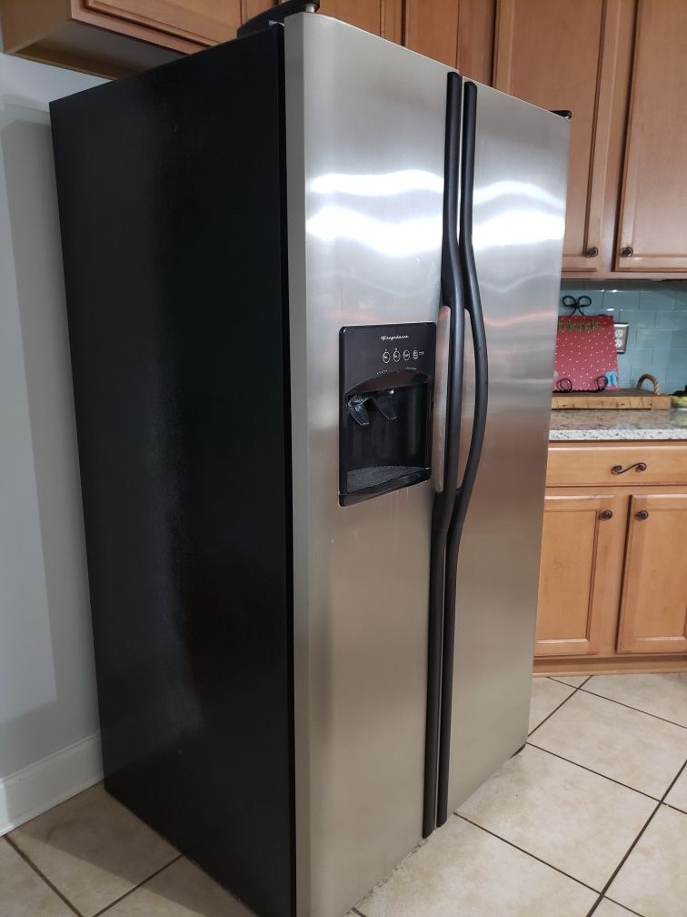 Frigidaire stainless steel & black side by side refrigerator