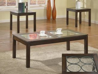 New coffee and end tables glass top