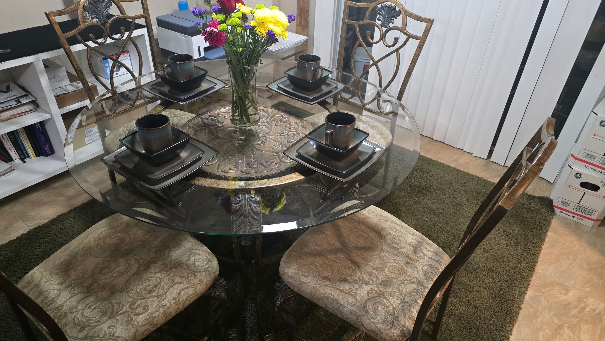 Glass-top dining table