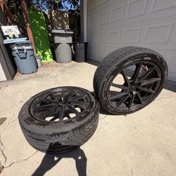 Selling infiniti g35 wheels with semi new tires 