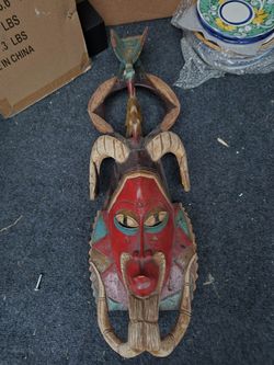 African Red Guro Mask with Carved Horns From The Ivory Coast 
